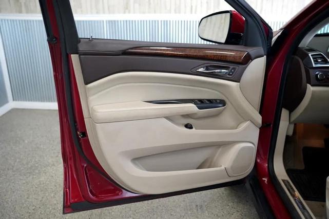 Photo of 2016 Crystal Red Tintcoat Cadillac SRX