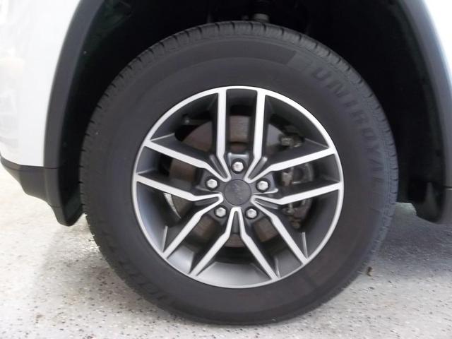 Photo of 2021 Bright White Clearcoat Jeep Grand Cherokee