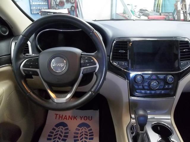 Photo of 2021 Bright White Clearcoat Jeep Grand Cherokee