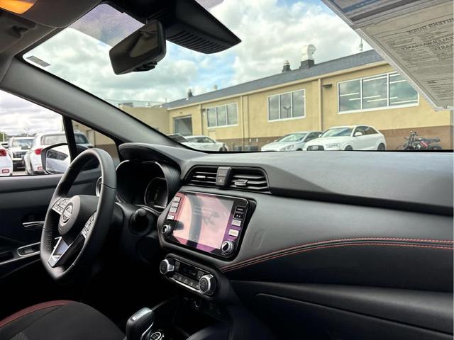 Photo of 2023 Aspen White Nissan Versa