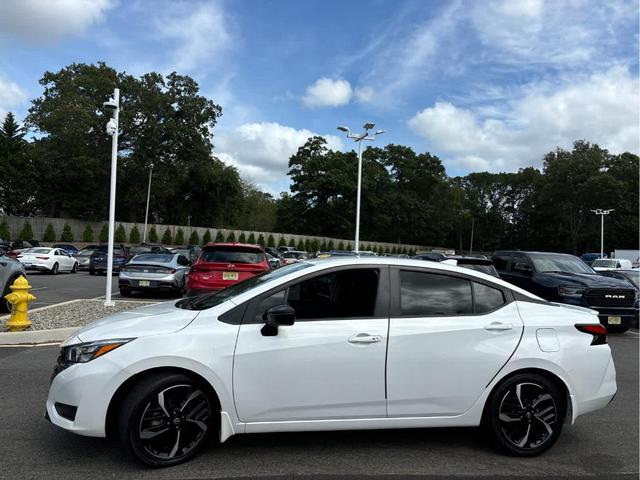 Photo of 2023 Aspen White Nissan Versa