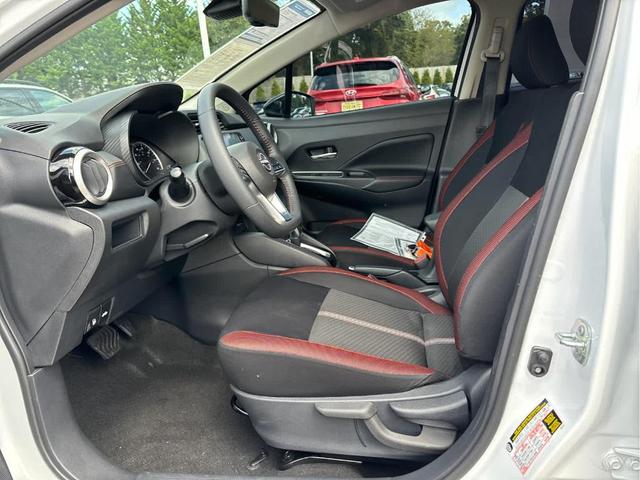 Photo of 2023 Aspen White Nissan Versa