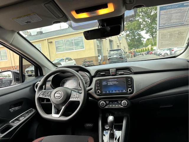 Photo of 2023 Aspen White Nissan Versa