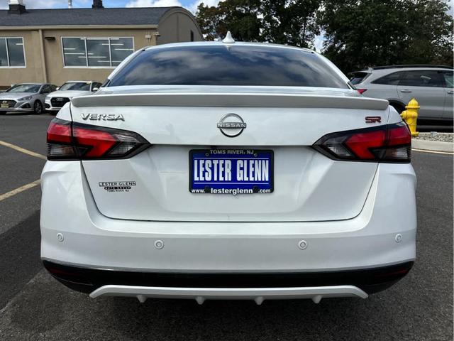 Photo of 2023 Aspen White Nissan Versa