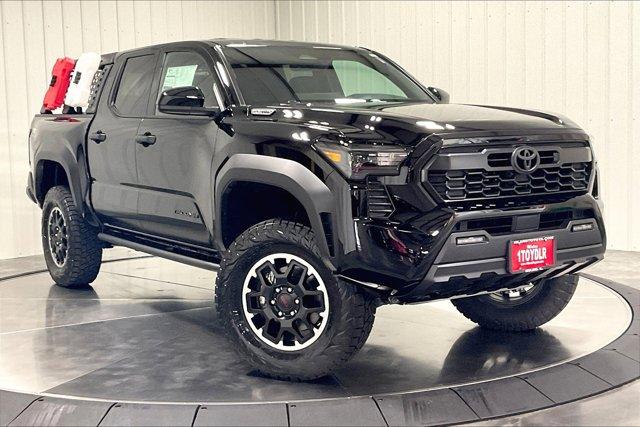 Photo of 2025 Black Toyota Tacoma