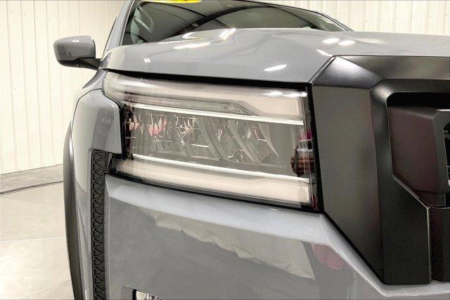 Photo of 2024 Boulder Gray Pearl Nissan Frontier