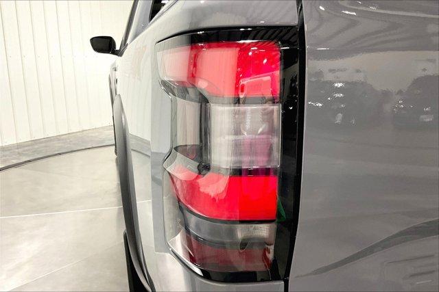 Photo of 2024 Boulder Gray Pearl Nissan Frontier