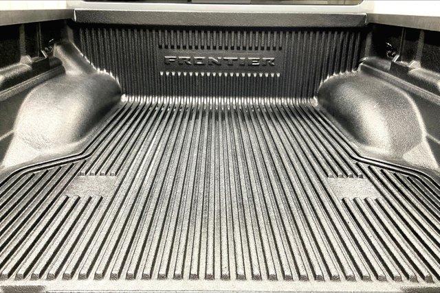 Photo of 2024 Boulder Gray Pearl Nissan Frontier