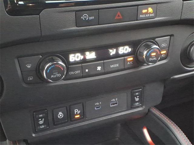 Photo of 2024 Tactical Green Metallic Nissan Frontier