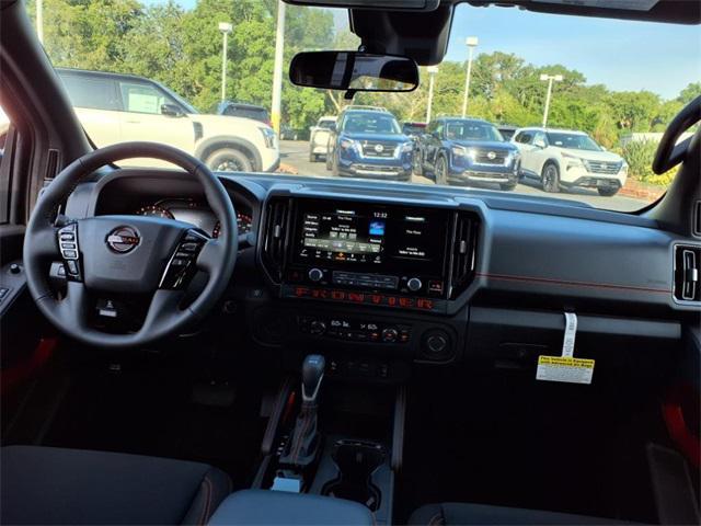 Photo of 2025 Boulder Gray Pearl Nissan Frontier