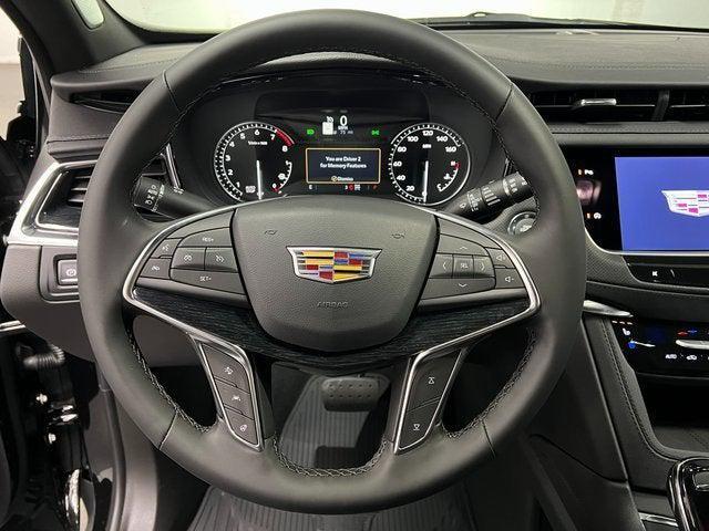 Photo of 2025 Exterior, Black Meet Kettle Met (384A) Cadillac XT5