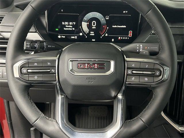 Photo of 2026 Volcanic Red Tintcoat GMC Acadia