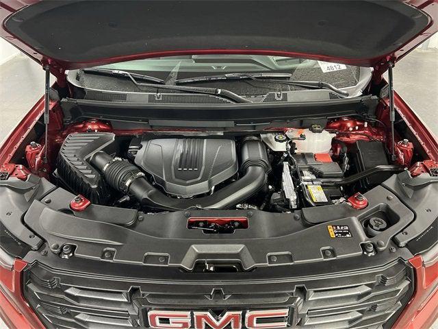 Photo of 2026 Volcanic Red Tintcoat GMC Acadia