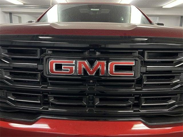 Photo of 2026 Volcanic Red Tintcoat GMC Acadia