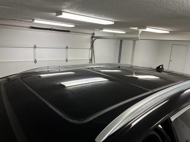 Photo of 2022 Stellar Black Metallic Cadillac XT5