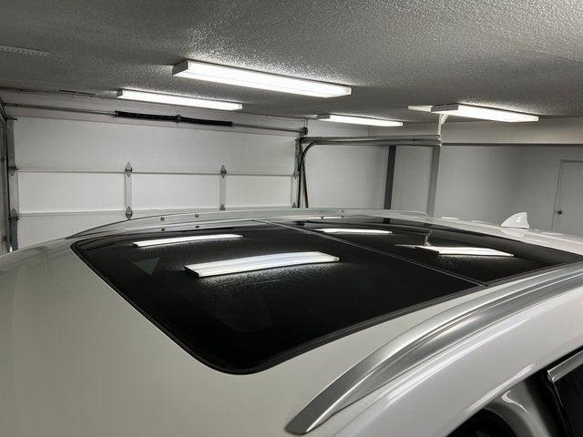 Photo of 2022 Crystal White Tricoat Cadillac XT5