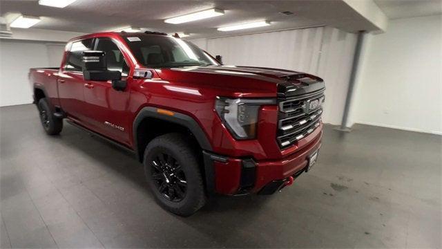 Photo of 2025 Volcanic Red Tintcoat GMC Sierra 2500