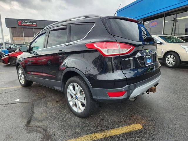 Photo of 2014 Tuxedo Black Ford Escape