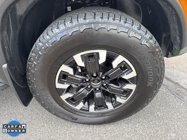 Photo of 2023 Tactical Green Metallic Nissan Frontier