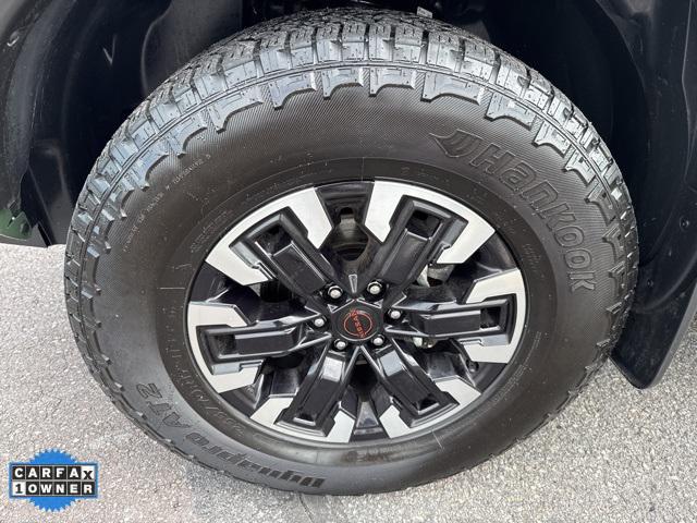 Photo of 2023 Tactical Green Metallic Nissan Frontier