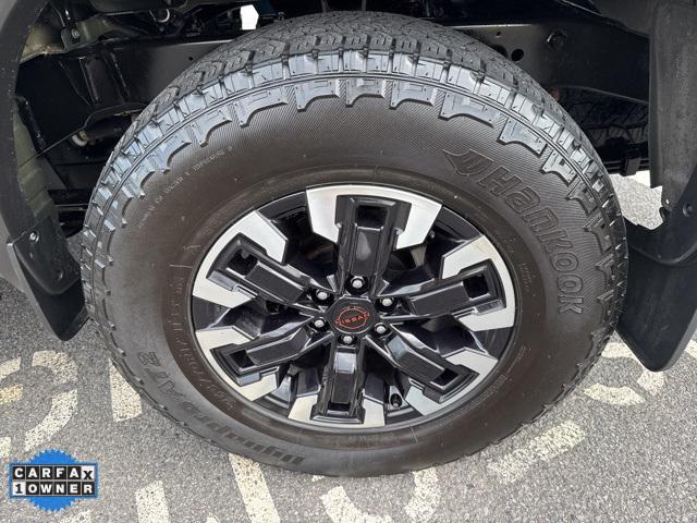 Photo of 2023 Tactical Green Metallic Nissan Frontier