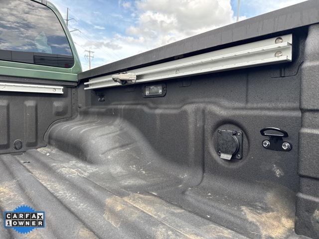 Photo of 2023 Tactical Green Metallic Nissan Frontier