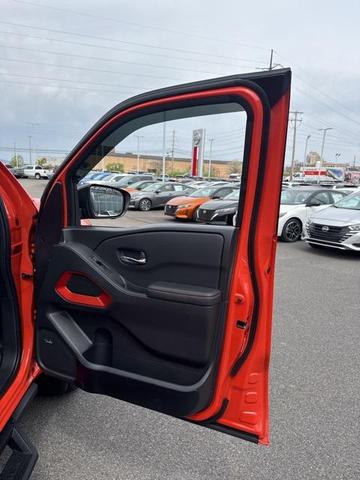 Photo of 2025 Afterburn Orange Nissan Frontier