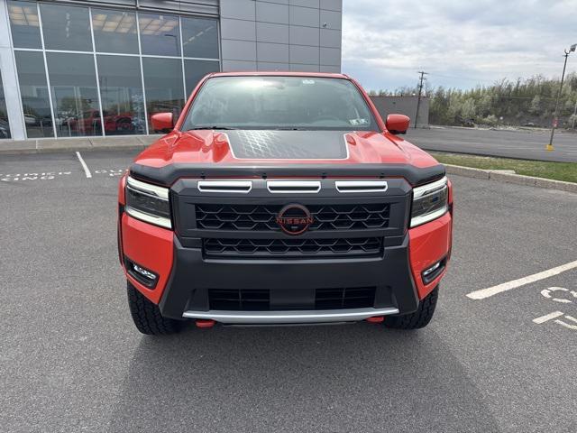 Photo of 2025 Afterburn Orange Nissan Frontier