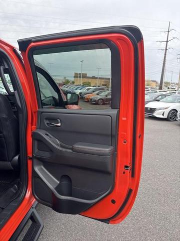 Photo of 2025 Afterburn Orange Nissan Frontier