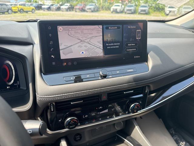 Photo of 2025 Baja Storm Metallic/Super Black Nissan Rogue