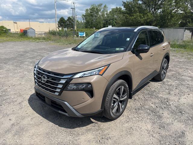 Photo of 2025 Baja Storm Metallic/Super Black Nissan Rogue