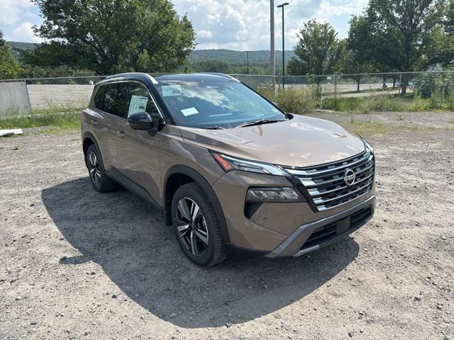 Photo of 2025 Baja Storm Metallic/Super Black Nissan Rogue