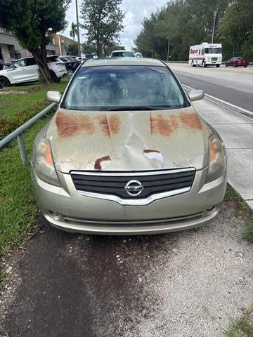 Photo of 2009 Sonoran Sand Metallic Nissan Altima
