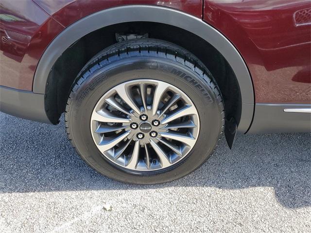 Photo of 2023 Burgundy Velvet Metallic Tinted Clearcoat Lincoln Nautilus