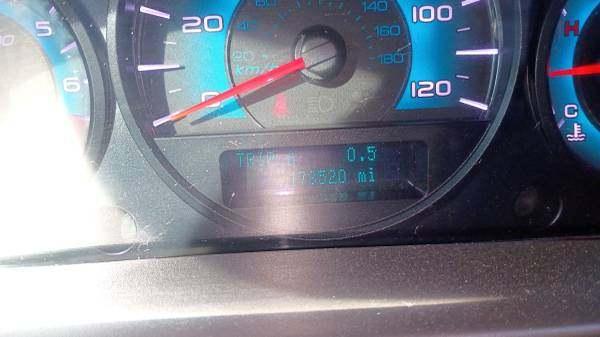 Photo of 2010 white Ford Fusion
