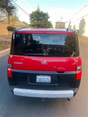 Photo of 2006 Rallye Red Honda Element