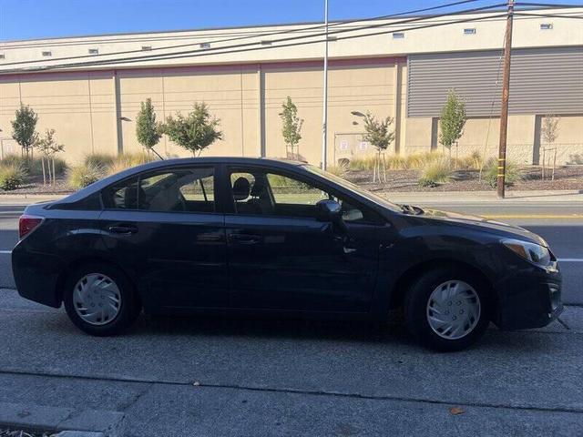 Photo of 2013 Crystal Black Silica Subaru Impreza