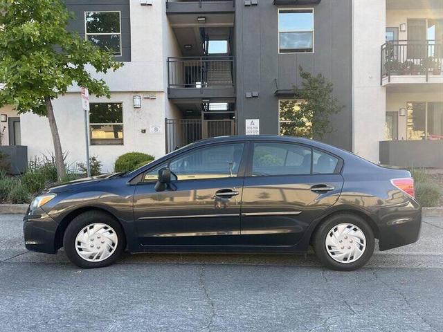 Photo of 2013 Crystal Black Silica Subaru Impreza