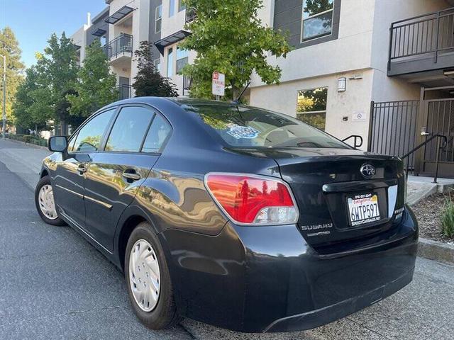 Photo of 2013 Crystal Black Silica Subaru Impreza