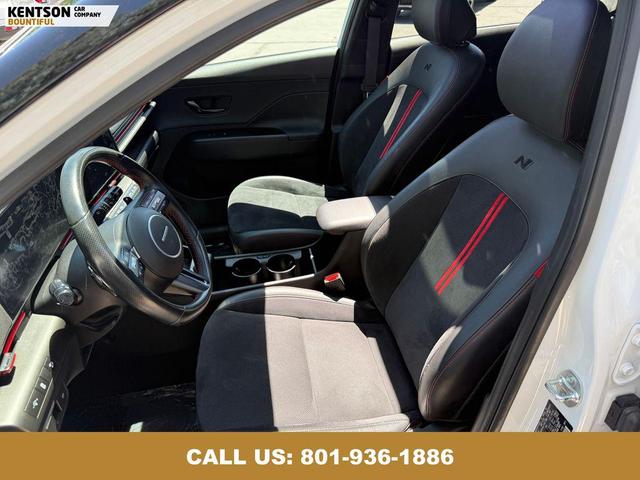 Photo of 2024 Atlast White w/Black Roof Hyundai KONA