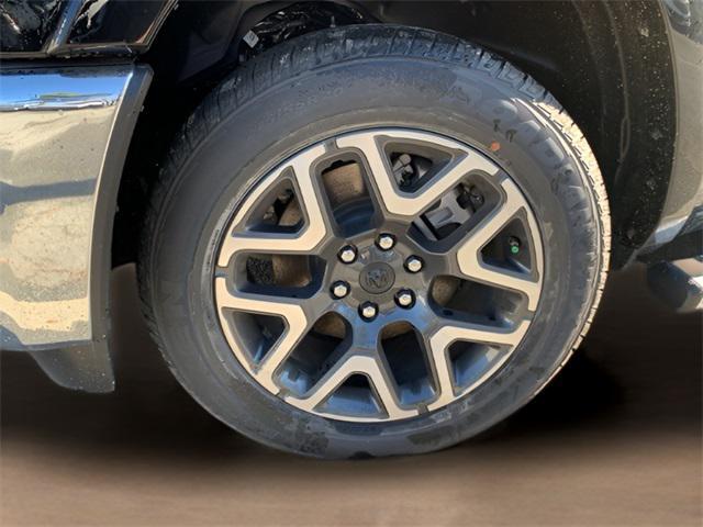 Photo of 2025 Diamond Black Crystal Pearlcoat RAM 1500