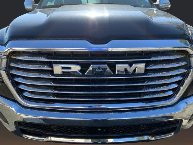 Photo of 2025 Diamond Black Crystal Pearlcoat RAM 1500