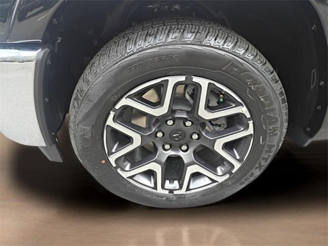 Photo of 2025 Diamond Black Crystal Pearlcoat RAM 1500