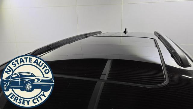 Photo of 2024 Diamond Black Crystal Pearlcoat Jeep Grand Cherokee L