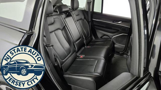 Photo of 2023 Diamond Black Crystal Pearlcoat Jeep Grand Cherokee 4xe
