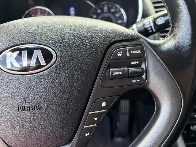 Photo of 2014 Bright Silver Kia Forte