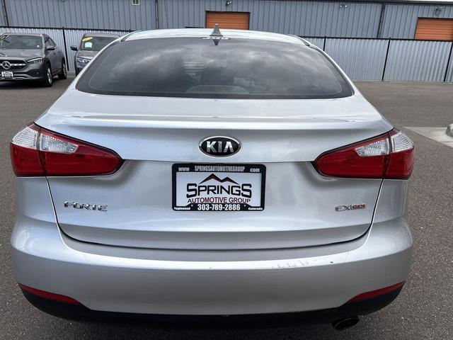 Photo of 2014 Bright Silver Kia Forte