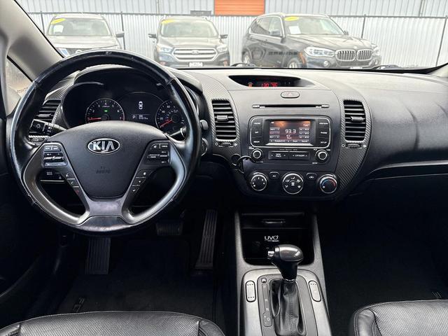 Photo of 2014 Bright Silver Kia Forte