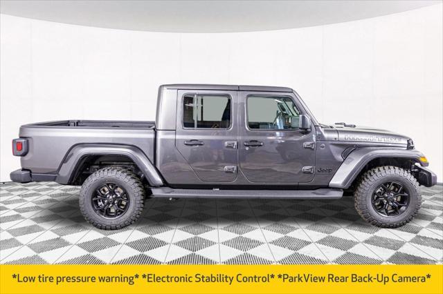Photo of 2025 Granite Crystal Metallic Clearcoat Jeep Gladiator