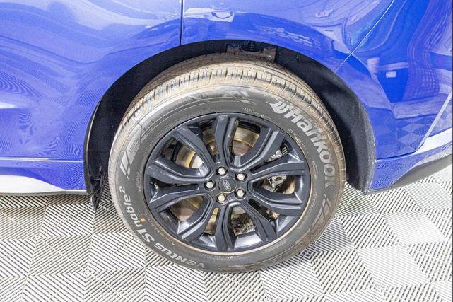 Photo of 2024 Atlas Blue Metallic Ford Edge
